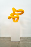 The shiny bright yellow colour of this engaging sculpture accentuates its elegant form. Image 2