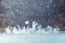 A line of white cloud rises at the foot of swirling silver calligraphy in this luminous canvas by Alice Teichert. Image 5