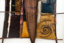 This mixed media contemporary assemblage resembles a vessel and is designed to be hung on a wall. Image 4