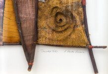 This mixed media contemporary assemblage resembles a vessel and is designed to be hung on a wall. Image 7