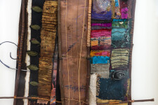 This mixed media contemporary assemblage resembles a vessel and is designed to be hung on a wall. Image 9