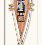 This mixed media contemporary assemblage resembles a vessel and is designed to be hung on a wall. Image 4