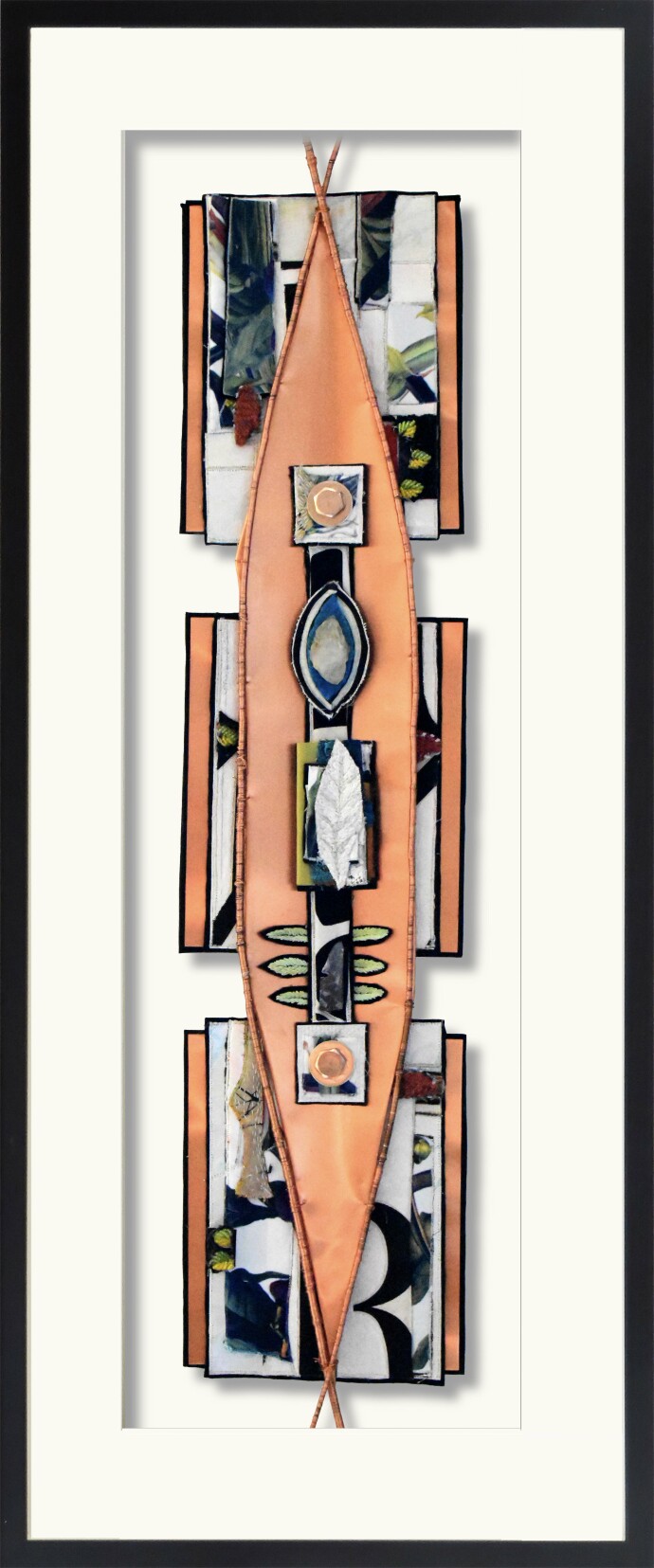 This mixed media contemporary assemblage resembles a vessel and is designed to be hung on a wall.