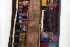 This mixed media contemporary assemblage resembles a vessel and is designed to be hung on a wall. Image 6