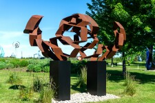 This monumental metal outdoor sculpture is rendered in a contemporary geometric form. Image 2