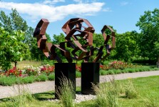 This monumental metal outdoor sculpture is rendered in a contemporary geometric form. Image 10