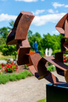 This monumental metal outdoor sculpture is rendered in a contemporary geometric form. Image 8