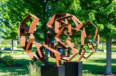 This monumental metal outdoor sculpture is rendered in a contemporary geometric form. Image 6