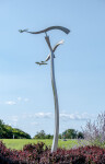 The graceful flight of two birds is captured in this stunningly elegant contemporary sculpture by Amos Robinson. Image 2