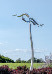 The graceful flight of two birds is captured in this stunningly elegant contemporary sculpture by Amos Robinson. Image 3