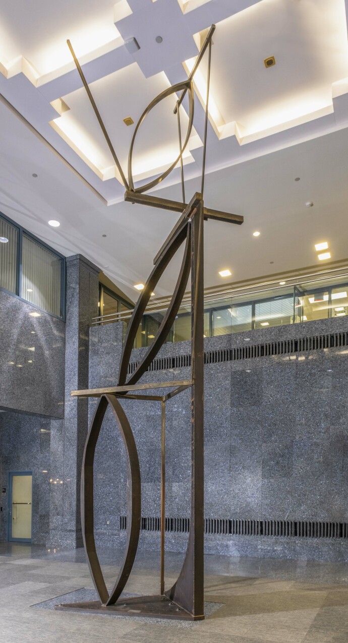 A high modern abstract, monumentally-scaled sculpture by sculptor, André Fauteux, in welded steel and brass.