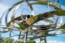 This contemporary outdoor sculpture is forged from stainless steel to resemble clouds. Image 7