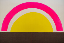Aron Hill returns to bright colours and familiar bold imagery—the sun and rocks in this contemporary landscape. Image 7