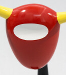 The distinctive shape of a bull’s head attached to a horn-like stand pops in glossy bright colours of red, yellow and black in this whimsica… Image 7