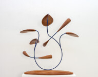 This abstract pop art table top sculpture depicts flowers. Image 2