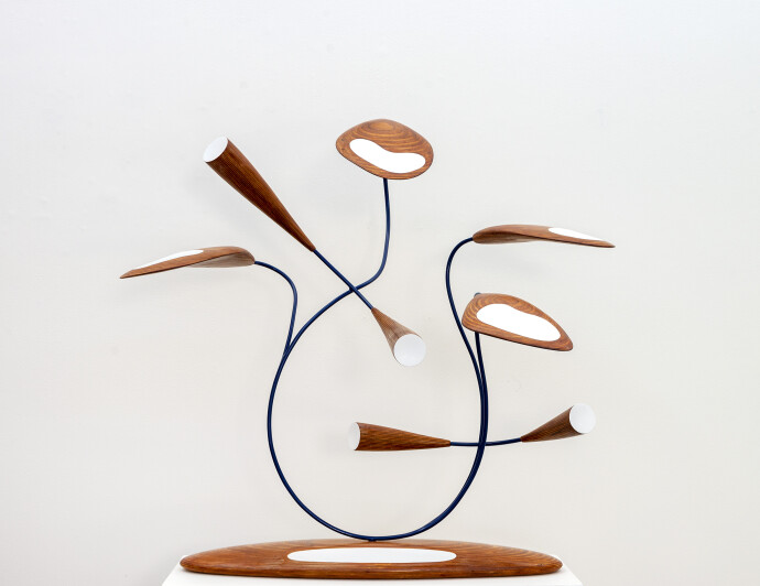 This abstract pop art table top sculpture depicts flowers.