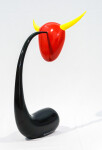 The distinctive shape of a bull’s head attached to a horn-like stand pops in glossy bright colours of red, yellow and black in this whimsica… Image 3