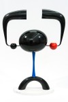 Using glossy, minimalist forms in black with bright green, blue, red and white, Israeli-based sculptor Benny Katz creates the playful essenc… Image 3