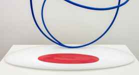 This abstract pop art table top wooden sculpture depicts flowers. Image 5