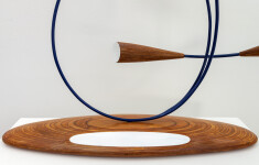 This abstract pop art table top sculpture depicts flowers. Image 4