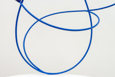 This abstract pop art table top wooden sculpture depicts flowers. Image 7