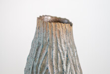 This contemporary tall ceramic vessel is handmade. Image 7