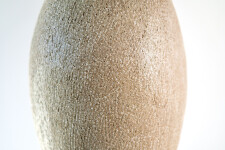 This unique tall ceramic vessel is handmade. Image 8