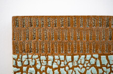 This contemporary ceramic wall tile is handmade. Image 6