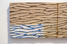 The contemporary horizontal panels of this wall composition are handmade in ceramic. Image 5