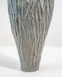 This contemporary tall ceramic vessel is handmade. Image 5