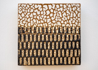 This contemporary ceramic wall tile is handmade.