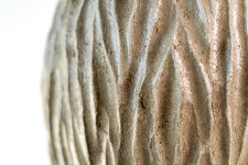 This unique tall ceramic vessel is handmade. Image 8