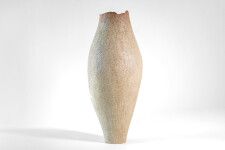This unique tall ceramic vessel is handmade. Image 4