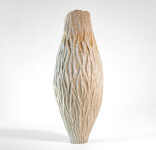 This unique tall ceramic vessel is handmade. Image 3