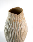 This unique tall ceramic vessel is handmade. Image 7