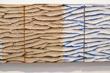 The contemporary horizontal panels of this wall composition are handmade in ceramic. Image 6