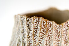 This unique tall ceramic vessel is handmade. Image 12