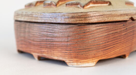 This contemporary ceramic box by Bruce Cochrane has a fish design on its lid. Image 6