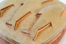 This contemporary ceramic box by Bruce Cochrane has a fish design on its lid. Image 9