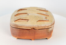 This contemporary ceramic box by Bruce Cochrane has a fish design on its lid. Image 2