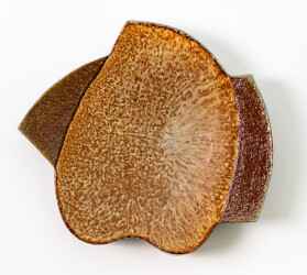 This contemporary ceramic wall plate is by Bruce Cochrane.