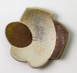 This contemporary ceramic wall plate is by Bruce Cochrane.