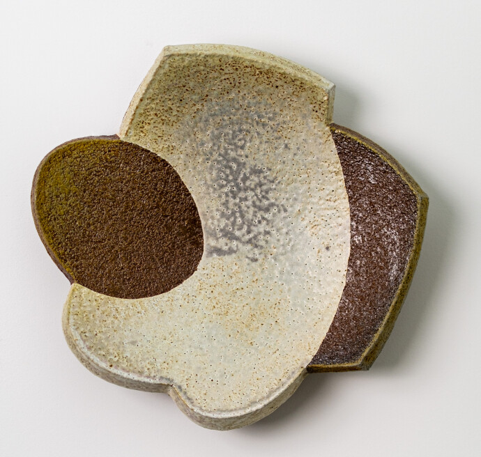 This contemporary ceramic wall plate is by Bruce Cochrane.