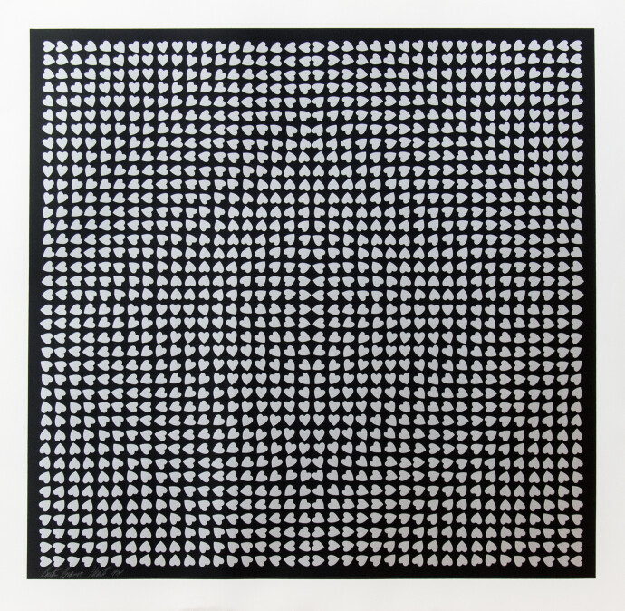 Small silver hearts in a precise geometric design on a black ground create an optical pattern of concentric squares.