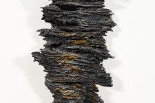 This contemporary glass wall sculpture by Cheryl Wilson Smith is black and sienna in colour. Image 8
