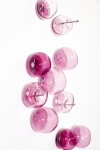 This contemporary wall sculpture of pink bubbles is hand-made from blown glass. Image 5