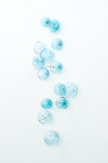 This contemporary wall sculpture features bubbles of blue glass. Image 11