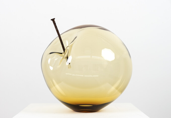 This contemporary amber glass tabletop sculpture is by Cheryl Wilson Smith.