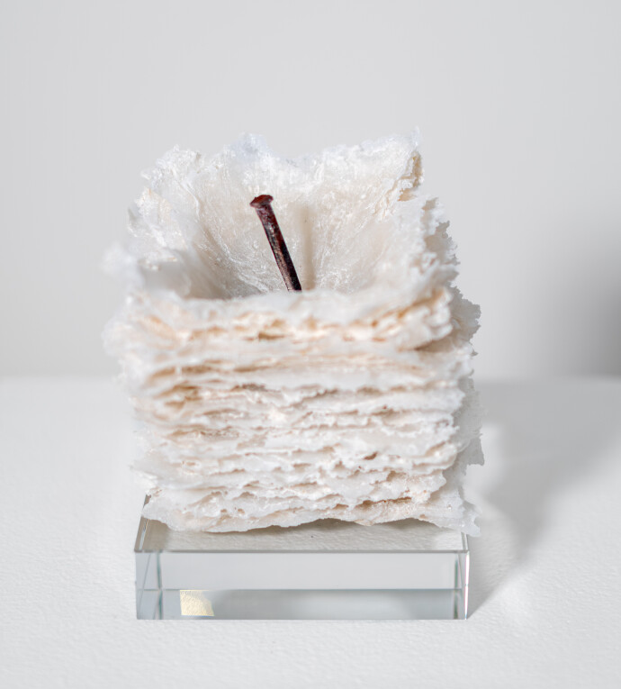 This contemporary table top white glass sculpture is by Cheryl Wilson Smith.