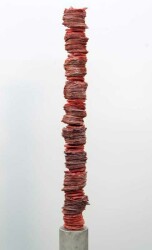 Paper-thin layers of deep red glass frit (special ground glass) are carefully stacked in these striking columns created by Canadian artist C…